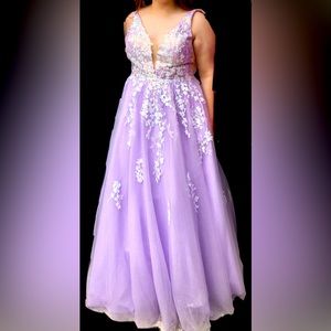 Prom dress, size 18, but can go up due to corset back
